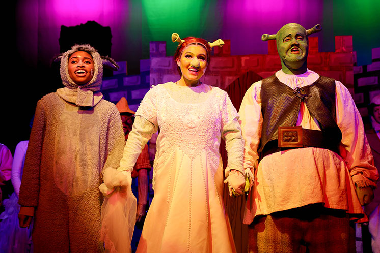 Students performing in a "Shrek" play. Links to Gifts That Pay You Income gifts_income.jpg