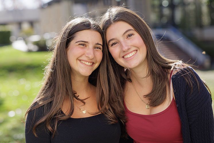 Two students smile together. Links to Gifts of Life Insurance Two students smile together. Links to Gifts of Life Insurance