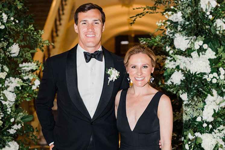 A man and woman smiling together