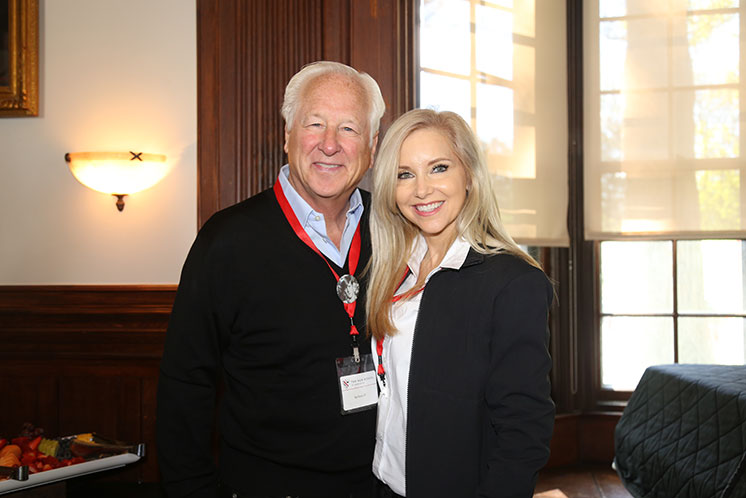 A man and woman smiling together. A man and woman smiling together.
