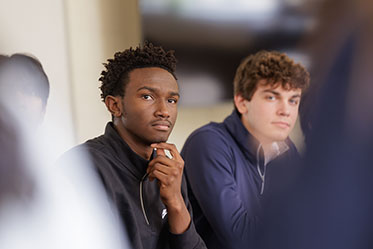 Students paying attention in class. Links to Closely Held Business Stock Students paying attention in class. Links to Closely Held Business Stock